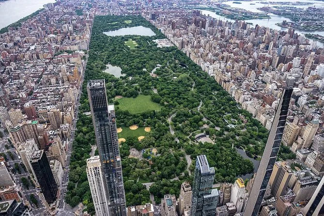 Central Park from the air, flanked by supertall towers