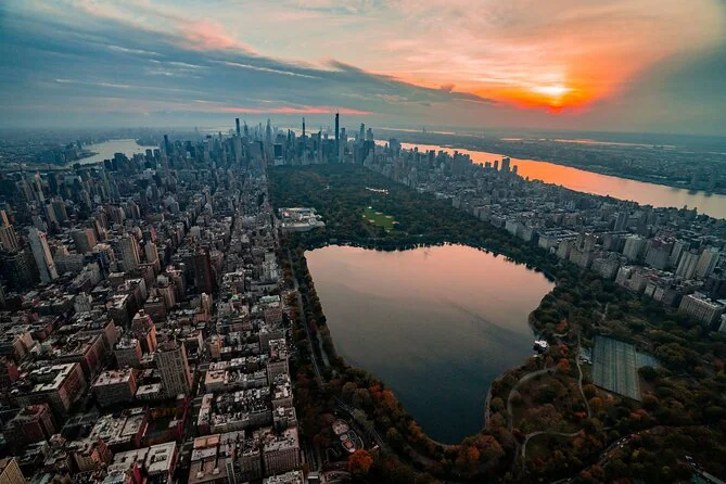 Central Park's reservoir at sunset with the Midtown skyline beyond
